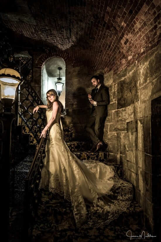 bride and groom on staircase