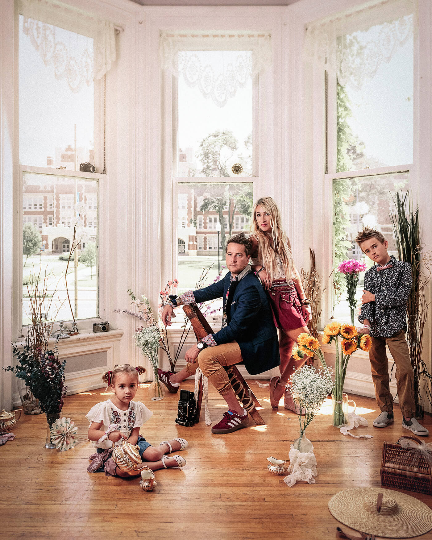 family photographed in vintage house