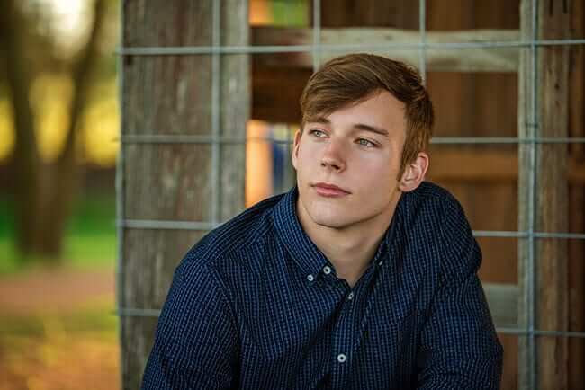 high school senior boy posing