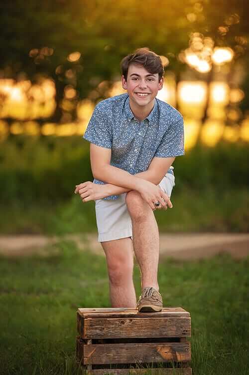 high school senior boy posing