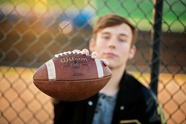 high school senior boy posing